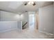 Landing area that leads to the bedrooms at 13715 Sunrise View Dr, Charlotte, NC 28278
