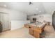 Spacious game room with ample seating, recessed lights and a ceiling fan at 16004 Tulloch Rd, Charlotte, NC 28278
