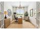 Bright home office with a modern desk, comfortable seating, and ample natural light at 16004 Tulloch Rd, Charlotte, NC 28278
