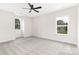 Bright bedroom features two windows and a ceiling fan for natural light and comfort at 1701 30Th Avenue Ne Ct, Hickory, NC 28601