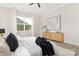 Comfortable bedroom featuring stylish decor, soft lighting, and a ceiling fan at 1701 30Th Avenue Ne Ct, Hickory, NC 28601