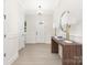 Inviting entryway featuring stylish console table and warm lighting at 1701 30Th Avenue Ne Ct, Hickory, NC 28601
