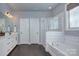 Bathroom featuring double vanity, soaking tub, and separate shower at 2030 Bosna Ln, Fort Mill, SC 29715