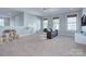 Cozy bonus room with comfortable seating, natural light, and neutral carpeting at 2030 Bosna Ln, Fort Mill, SC 29715