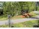Outdoor disc golf course surrounded by lush trees and manicured lawns, providing a scenic and challenging experience at 2030 Bosna Ln, Fort Mill, SC 29715