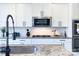 Close up of modern kitchen details: stainless steel appliances and granite countertops at 2030 Bosna Ln, Fort Mill, SC 29715