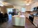 Bright kitchen featuring stainless steel appliances, center island, and an open layout for entertaining at 205 Cooke Cir, Kings Mountain, NC 28086