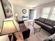 Living room with hardwood floors, comfortable seating and a welcoming atmosphere at 205 Cooke Cir, Kings Mountain, NC 28086