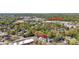 Wide aerial perspective of a residential area featuring tree coverage and the Savona Mill building at 210 Walford Dr, Charlotte, NC 28208