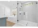 Bright bathroom with a modern tub, glass shower, and sleek design at 210 Walford Dr, Charlotte, NC 28208