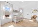 Bright Bedroom with white crib, hardwood floors, and two windows at 210 Walford Dr, Charlotte, NC 28208