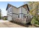 Exterior view of home showcasing a garage, a wooden fence, and stylish architecture at 210 Walford Dr, Charlotte, NC 28208
