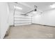 Spacious, clean garage with high ceilings and an automatic door at 210 Walford Dr, Charlotte, NC 28208