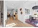 Bright hallway with hardwood floors, stylish decor, and seamless flow to the living and dining areas at 210 Walford Dr, Charlotte, NC 28208