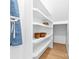 Walk-in pantry with custom shelving for organized storage of kitchen essentials at 210 Walford Dr, Charlotte, NC 28208
