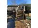 Exterior view of back porch, stairs, and door to mobile home at 2504 Windswept Way, Rockwell, NC 28138