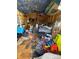 A bedroom filled with clutter and various items strewn around the space, including clothes and personal belongings at 2504 Windswept Way, Rockwell, NC 28138