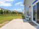 This cozy patio extends to a well-maintained lawn, bordered by a secure fence ensuring privacy and space for children to play at 3042 Burnello Ct, Iron Station, NC 28080