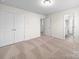 Spacious bedroom with double closets and an ensuite bathroom entrance at 3042 Burnello Ct, Iron Station, NC 28080