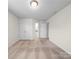 Spacious bedroom offers neutral carpet, double closets and an ensuite bathroom at 3042 Burnello Ct, Iron Station, NC 28080