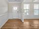 Light and bright foyer with wood floors and traditional trim at 3042 Burnello Ct, Iron Station, NC 28080