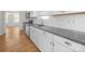 Modern kitchen featuring stainless steel appliances, granite countertops, and white subway tile backsplash at 3042 Burnello Ct, Iron Station, NC 28080