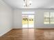 Bright and airy living room with access to the backyard and lots of natural light at 3042 Burnello Ct, Iron Station, NC 28080