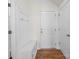 Welcoming mudroom features storage bench, coat hooks, and access to the garage at 3042 Burnello Ct, Iron Station, NC 28080