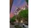 Modern urban living, highlighted by the building's architectural design, lush greenery, and street-side appeal at 315 Arlington Ave # 506 & 507, Charlotte, NC 28203