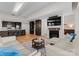 Open living space featuring modern kitchen, living room, and fireplace at 315 Arlington Ave # 506 & 507, Charlotte, NC 28203