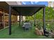 Spacious rooftop patio with an elegant pergola and comfortable seating, perfect for outdoor dining and entertaining guests at 315 Arlington Ave # 506 & 507, Charlotte, NC 28203