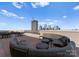 Rooftop deck with comfortable seating and city skyline views, perfect for entertaining and relaxation at 315 Arlington Ave # 506 & 507, Charlotte, NC 28203