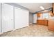 Well-lit kitchen with ample storage, featuring oak cabinets, laminate countertops, and easy access to adjacent rooms at 3203 Valleydale Rd, Monroe, NC 28110