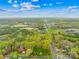 Expansive aerial view showing the property's landscape and accessibility to community, water tower and houses of worship at 322 S Main St, Shelby, NC 28152
