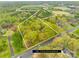 Expansive aerial view of a 27-acre lot, partially wooded and outlined with approximate property lines at 322 S Main St, Shelby, NC 28152