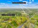 Aerial view of property in a wooded setting close to educational opportunities at 322 S Main St, Shelby, NC 28152