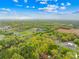 Picturesque aerial view of property near ball fields, church and surrounding community, blends serenity with local amenities at 322 S Main St, Shelby, NC 28152