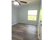 Bedroom featuring luxury vinyl flooring and natural light at 3325 Stony Brook Cir, Newton, NC 28658