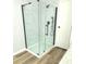 Modern shower with clear glass and matte black hardware at 3325 Stony Brook Cir, Newton, NC 28658