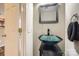 Stylish half bathroom with vessel sink, decorative mirror, and modern fixtures at 3420 Caldwell Ridge Pkwy, Charlotte, NC 28213