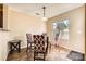 Cozy dining area with window and modern chairs at 3420 Caldwell Ridge Pkwy, Charlotte, NC 28213