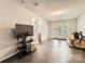 Spacious living room featuring tile floors and french doors leading to the exterior at 3420 Caldwell Ridge Pkwy, Charlotte, NC 28213