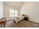 Cozy bedroom featuring plush carpeting, vaulted ceilings and large windows with abundant natural light at 3901 Parkers Fry None, Fort Mill, SC 29715
