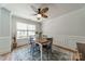 Formal dining room features a designer rug, natural light and a modern ceiling fan at 3901 Parkers Fry None, Fort Mill, SC 29715