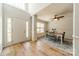Bright foyer boasts hardwood floors, wainscotting detail, and views into the formal dining area at 3901 Parkers Fry None, Fort Mill, SC 29715