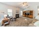 Comfortable living room with a fireplace, television, and neutral decor at 3901 Parkers Fry None, Fort Mill, SC 29715