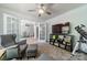 Spacious living room with TV, and access to the dining room, creating an open floor plan at 3901 Parkers Fry None, Fort Mill, SC 29715