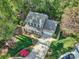 Aerial view of a well-manicured home with a two-car garage and lush landscaping at 394 Runnymede Dr, Rock Hill, SC 29732