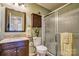 Cozy bathroom with granite countertop vanity and a glass-enclosed shower at 394 Runnymede Dr, Rock Hill, SC 29732