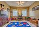 Bright bedroom with colorful decor, toys, and ample play space at 394 Runnymede Dr, Rock Hill, SC 29732